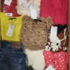 The photo shows a package with clothing in the category TSC.
