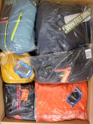 The photo shows a package with clothing in the category AJS.