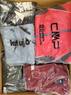 The photo shows a package with clothing in the category AJS.