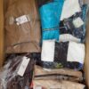 AJS467 2 The photo shows a package with clothing in the category AJS.
