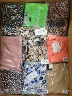 The photo shows a package with clothing in the category AR.