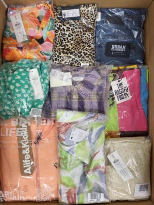 The photo shows a package with clothing in the category AR.