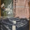 The photo shows a package with clothing in the category AJW.