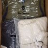 The photo shows a package with clothing in the category AJW.