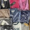 The photo shows a package with clothing in the category B.