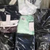 The photo shows a package with clothing in the category B.