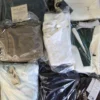 The photo shows a package with clothing in the category B.