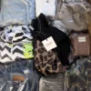 The photo shows a package with clothing in the category B.