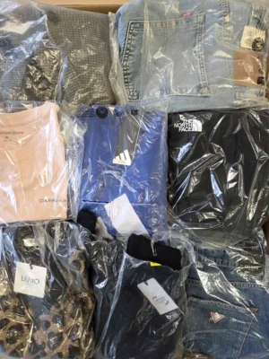The photo shows a package with clothing in the category B.