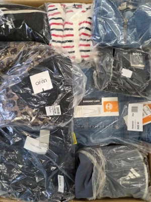The photo shows a package with clothing in the category B.