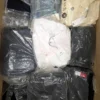 The photo shows a package with clothing in the category D.