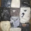 The photo shows a package with clothing in the category D.