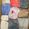 The photo shows a package with clothing in the category D.