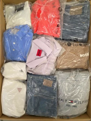 The photo shows a package with clothing in the category D.