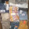 The photo shows a package with clothing in the category B.