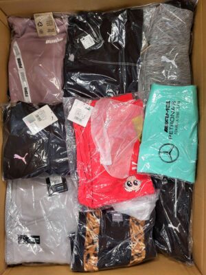 The photo shows a package with clothing in the category AP.