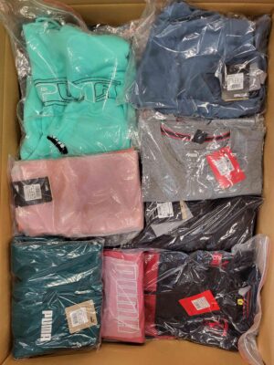 The photo shows a package with clothing in the category AP.
