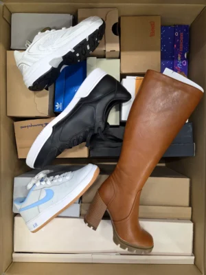 The photo shows a package with footwear in the category BS.