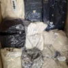The photo shows a package with clothing in the category B.