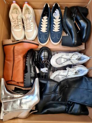 The photo shows a package with clothing in the category BPS.