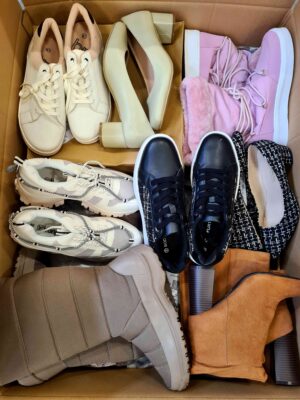 The photo shows a package with clothing in the category BPS.