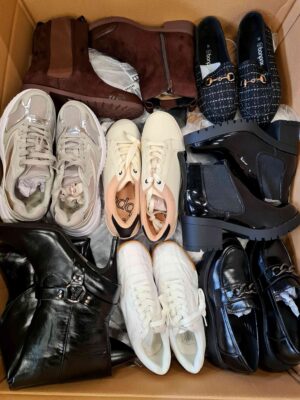 The photo shows a package with clothing in the category BPS.