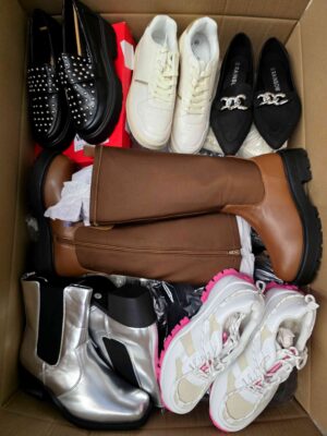 The photo shows a package with clothing in the category BPS.