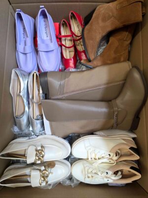 The photo shows a package with clothing in the category BPS.