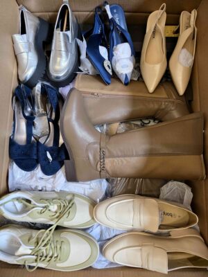 The photo shows a package with clothing in the category BPS.