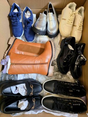 The photo shows a package with clothing in the category BPS.