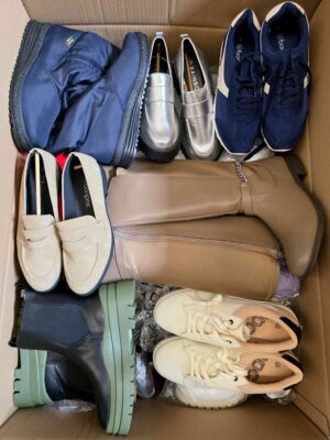 The photo shows a package with clothing in the category BPS.