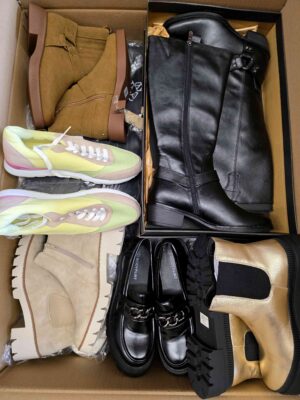 The photo shows a package with clothing in the category BPS.