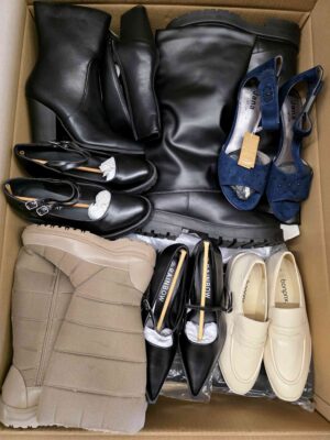 The photo shows a package with clothing in the category BPS.