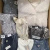 The photo shows a package with clothing in the category B.