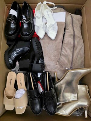 The photo shows a package with clothing in the category BPS.