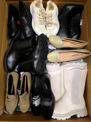 The photo shows a package with clothing in the category BPS.