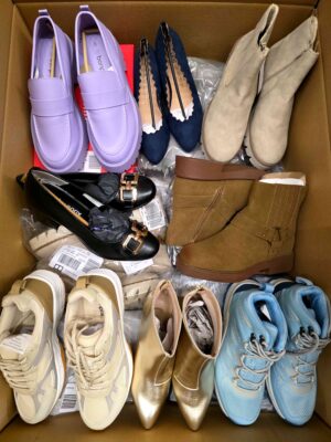 The photo shows a package with clothing in the category BPS.