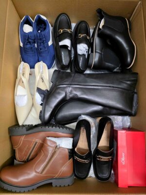 The photo shows a package with clothing in the category BPS.