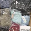 The photo shows a package with clothing in the category B.