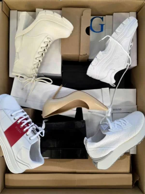 The photo shows a package with footwear in the category BS.