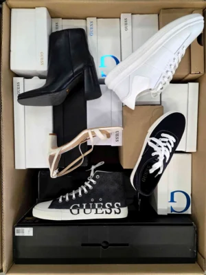 The photo shows a package with footwear in the category BS.