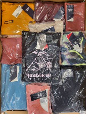 The photo shows a package with clothing in the category R.