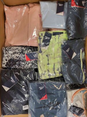 The photo shows a package with clothing in the category R.