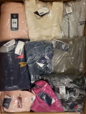 The photo shows a package with clothing in the category R.