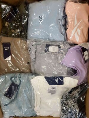 The photo shows a package with clothing in the category R.