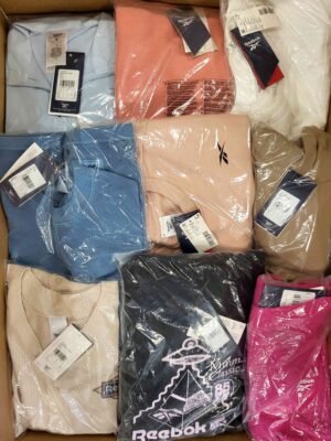 The photo shows a package with clothing in the category R.