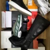 The photo shows a package with footwear in the category CS.