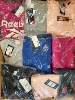 The photo shows a package with clothing in the category R.