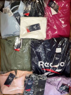 The photo shows a package with clothing in the category R.