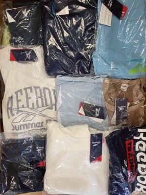 The photo shows a package with clothing in the category R.